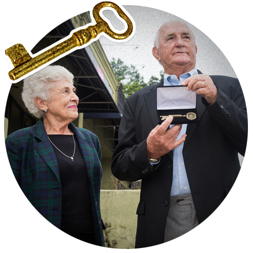 Golden Pantry founder, Tom Griffith accepts the Key to the City from Athens-Clarke County Mayor Nancy Denson